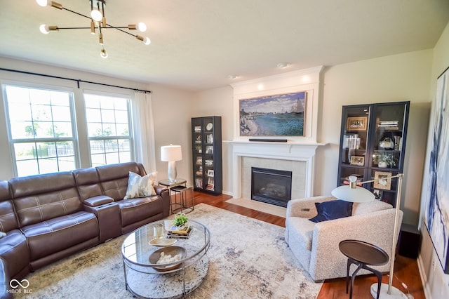 6802 Chorleywood Cir, Indianapolis, IN 46259 - living area featuring wood finished floors, a chandelier, and a tile fireplace