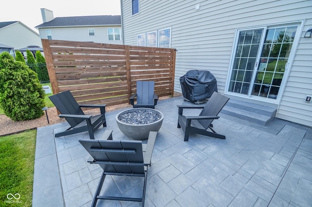 6802 Chorleywood Cir, Indianapolis, IN 46259 - view of patio / terrace featuring an outdoor fire pit and area for grilling