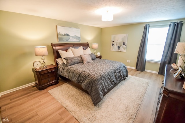 6802 Chorleywood Cir, Indianapolis, IN 46259 - bedroom featuring light wood-style floors and baseboards