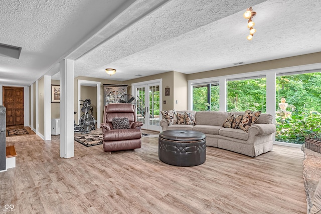 5052 Sherwood Ct, Pittsboro, IN 46167 - living room with wood finished floors and a textured ceiling
