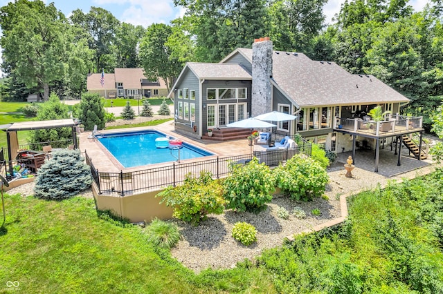 5052 Sherwood Ct, Pittsboro, IN 46167 - view of pool featuring a deck, stairway, a patio, and view of wooded area