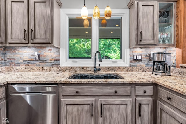 5052 Sherwood Ct, Pittsboro, IN 46167 - kitchen with stainless steel dishwasher, backsplash, glass insert cabinets, and pendant lighting