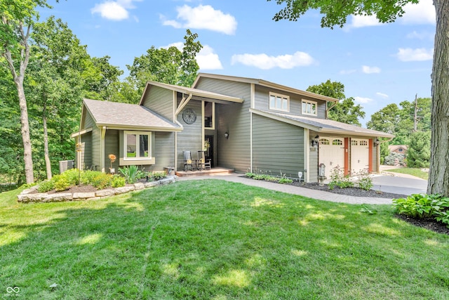 5052 Sherwood Ct, Pittsboro, IN 46167 - tri-level home with a garage, driveway, and a front lawn