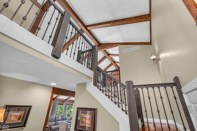 5052 Sherwood Ct, Pittsboro, IN 46167 - stairway with a high ceiling and baseboards