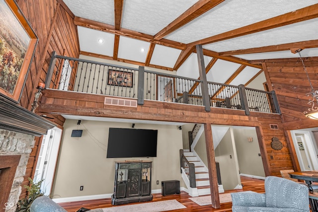 5052 Sherwood Ct, Pittsboro, IN 46167 - living area featuring high vaulted ceiling, stairs, wood finished floors, a fireplace, and recessed lighting