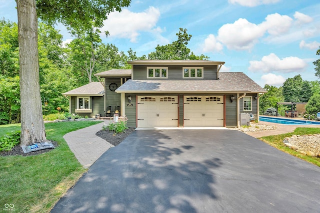 5052 Sherwood Ct, Pittsboro, IN 46167 - view of front of home with asphalt driveway, roof with shingles, and a garage