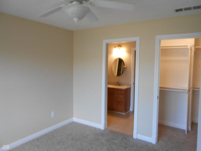 7653 W Old Colony Dr, New Palestine, IN 46163 - unfurnished bedroom featuring carpet flooring, a closet, and ceiling fan