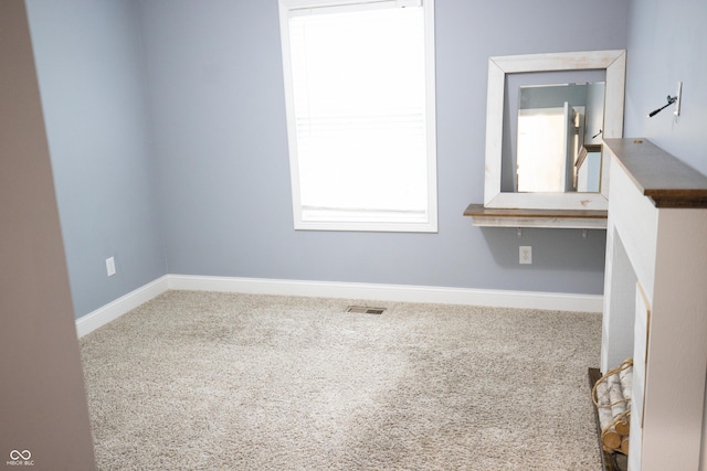 7653 W Old Colony Dr, New Palestine, IN 46163 - carpeted empty room featuring baseboards