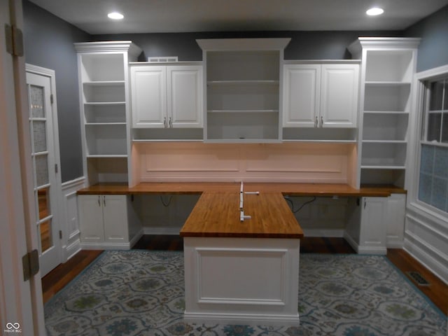 7653 W Old Colony Dr, New Palestine, IN 46163 - unfurnished office featuring built in desk, dark wood finished floors, and recessed lighting