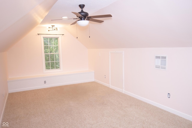 7653 W Old Colony Dr, New Palestine, IN 46163 - bonus room featuring carpet floors, lofted ceiling, and a ceiling fan
