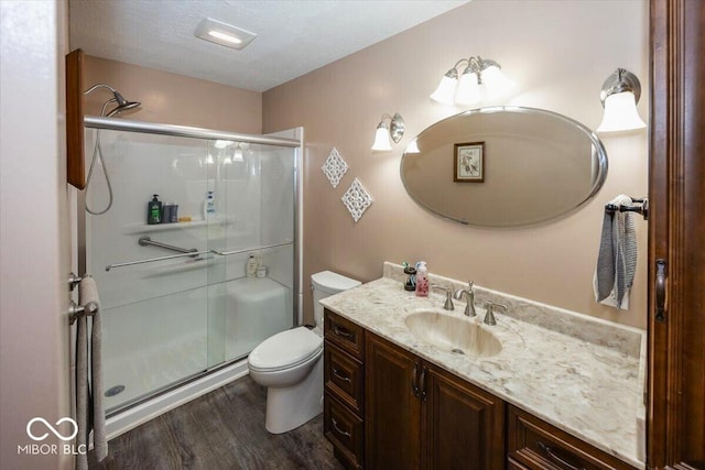 8546 N Chickadee Dr, Morgantown, IN 46160 - full bath featuring vanity, a shower stall, and wood finished floors