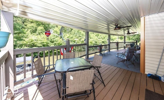 8546 N Chickadee Dr, Morgantown, IN 46160 - deck featuring area for grilling, outdoor dining space, and a ceiling fan