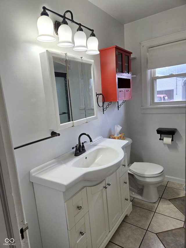 2311 Gilmore St, Columbus, IN 47201 - half bathroom featuring vanity and tile patterned floors