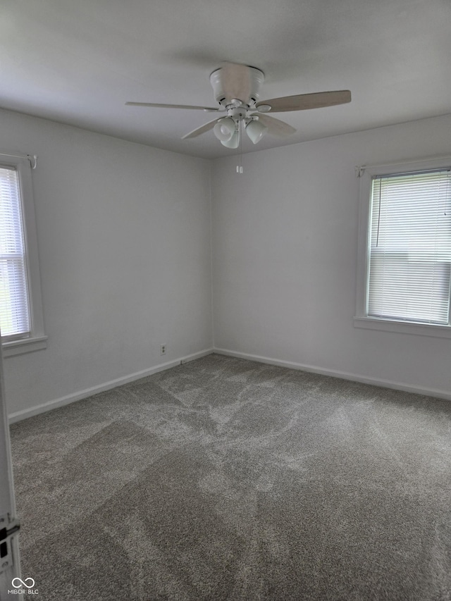2311 Gilmore St, Columbus, IN 47201 - carpeted spare room featuring plenty of natural light and a ceiling fan