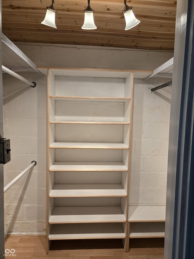 2311 Gilmore St, Columbus, IN 47201 - walk in closet featuring wood finished floors