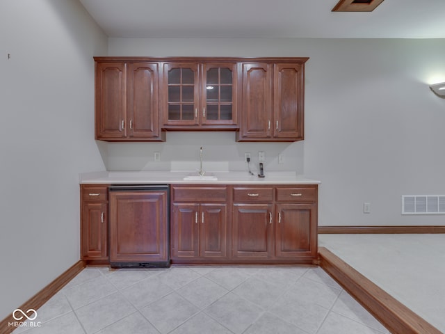 2025 Caledonian Ct, Greenwood, IN 46143 - bar featuring paneled dishwasher and light tile patterned floors