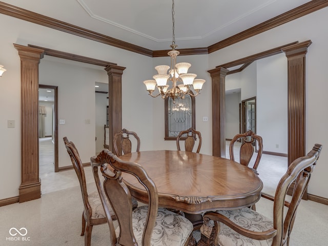 2025 Caledonian Ct, Greenwood, IN 46143 - dining area featuring ornate columns, light carpet, a chandelier, and ornamental molding