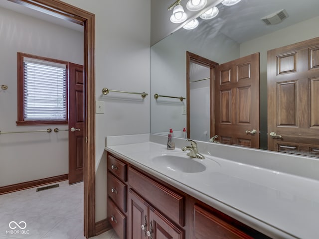 2025 Caledonian Ct, Greenwood, IN 46143 - bathroom featuring vanity and tile patterned flooring