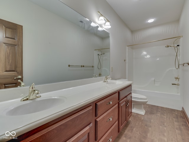 2025 Caledonian Ct, Greenwood, IN 46143 - full bathroom with washtub / shower combination, double vanity, and wood finished floors