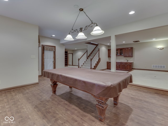 2025 Caledonian Ct, Greenwood, IN 46143 - recreation room featuring light wood-type flooring, bar area, pool table, and recessed lighting