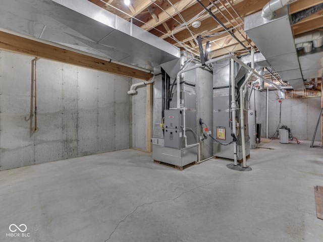 2025 Caledonian Ct, Greenwood, IN 46143 - unfinished basement with heating unit and water heater