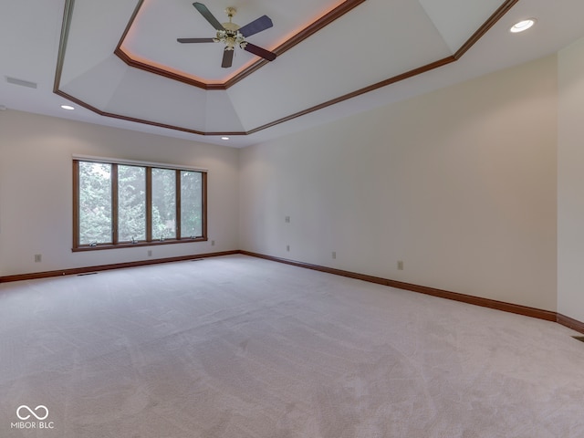 2025 Caledonian Ct, Greenwood, IN 46143 - unfurnished room with a ceiling fan, light carpet, recessed lighting, and a raised ceiling