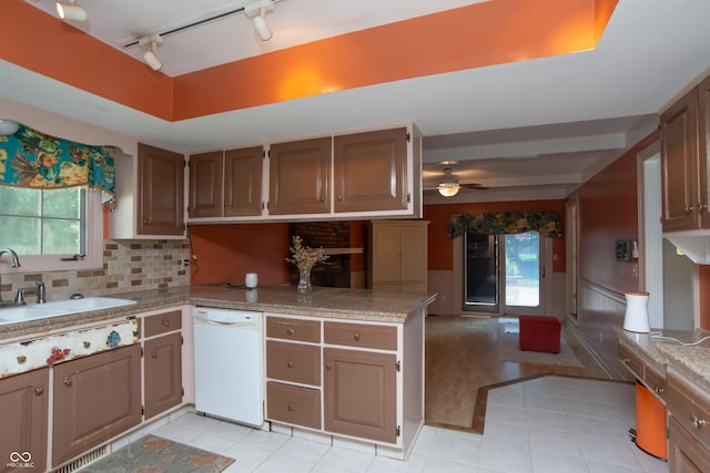 8841 Rocky Ridge Rd, Indianapolis, IN 46217 - kitchen with dishwasher, track lighting, light tile patterned floors, ceiling fan, and a wainscoted wall