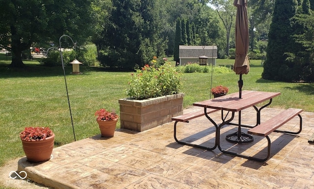 8841 Rocky Ridge Rd, Indianapolis, IN 46217 - view of patio featuring a shed and outdoor dining space