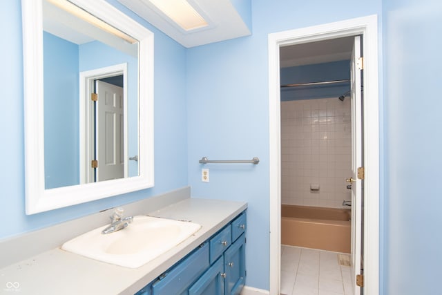 8841 Rocky Ridge Rd, Indianapolis, IN 46217 - bathroom with vanity, tile patterned floors, and bathing tub / shower combination