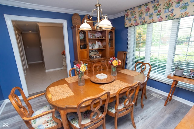 8841 Rocky Ridge Rd, Indianapolis, IN 46217 - dining space with baseboards and ornamental molding