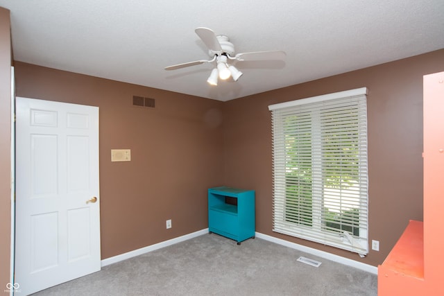 8841 Rocky Ridge Rd, Indianapolis, IN 46217 - unfurnished room featuring light carpet and ceiling fan