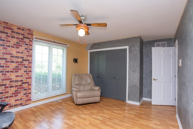 8841 Rocky Ridge Rd, Indianapolis, IN 46217 - sitting room with light wood-style floors and ceiling fan
