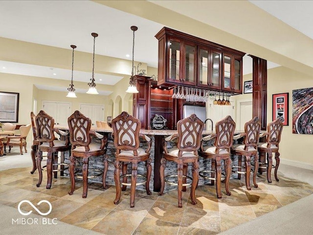 3808 Claybrook Ct, Bargersville, IN 46106 - bar area with decorative light fixtures and recessed lighting