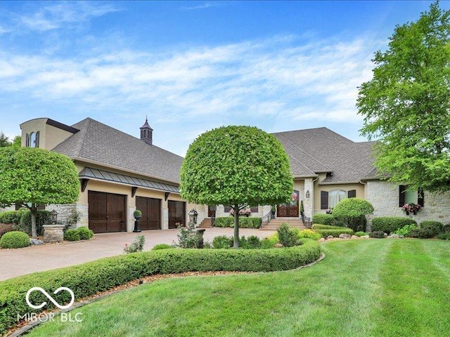 3808 Claybrook Ct, Bargersville, IN 46106 - french country home featuring a front lawn, concrete driveway, and a shingled roof