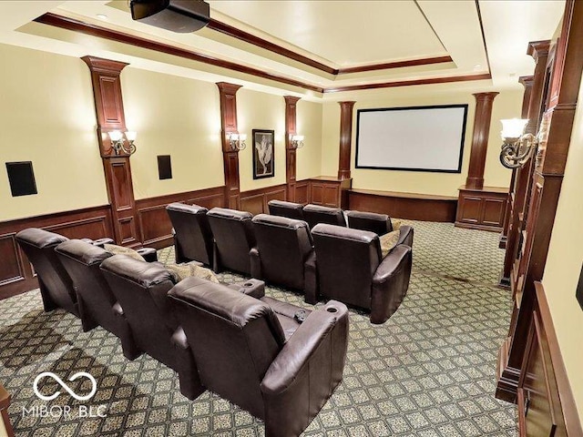 3808 Claybrook Ct, Bargersville, IN 46106 - cinema room featuring decorative columns, a tray ceiling, light carpet, wainscoting, and ornamental molding