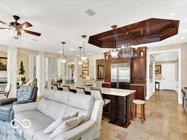 3808 Claybrook Ct, Bargersville, IN 46106 - living area featuring ceiling fan, stone tile flooring, ornamental molding, recessed lighting, and coffered ceiling