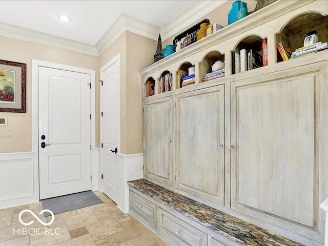 3808 Claybrook Ct, Bargersville, IN 46106 - mudroom featuring stone tile floors, ornamental molding, and a wainscoted wall