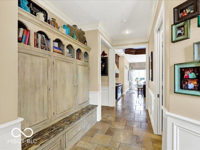 3808 Claybrook Ct, Bargersville, IN 46106 - corridor with crown molding, a decorative wall, stone tile floors, a wainscoted wall, and recessed lighting