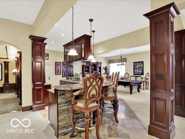 3808 Claybrook Ct, Bargersville, IN 46106 - indoor bar with light colored carpet, decorative light fixtures, arched walkways, ornate columns, and recessed lighting