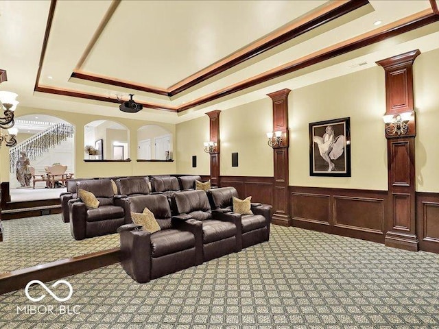 3808 Claybrook Ct, Bargersville, IN 46106 - cinema room featuring carpet floors, a tray ceiling, a wainscoted wall, ornamental molding, and a chandelier