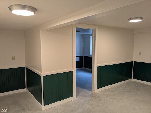 1630 Lawton Ave, Columbus, IN 47201 - spare room with a wainscoted wall
