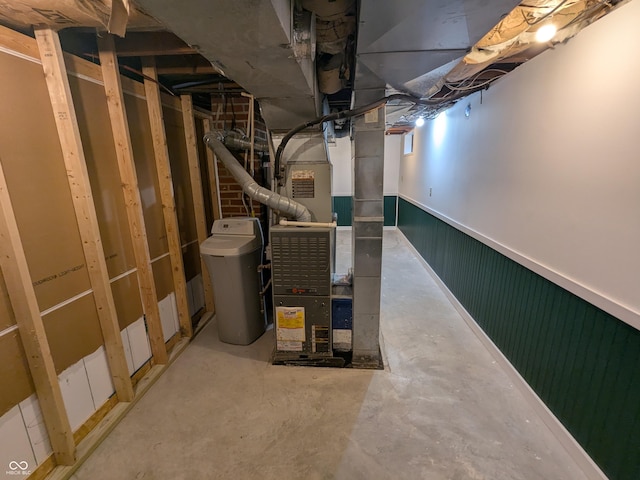 1630 Lawton Ave, Columbus, IN 47201 - unfinished basement with heating unit, a water softener, and wainscoting