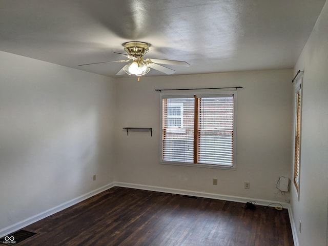 1630 Lawton Ave, Columbus, IN 47201 - empty room with ceiling fan and dark wood-style flooring