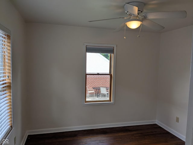 1630 Lawton Ave, Columbus, IN 47201 - spare room with ceiling fan and dark wood-style floors