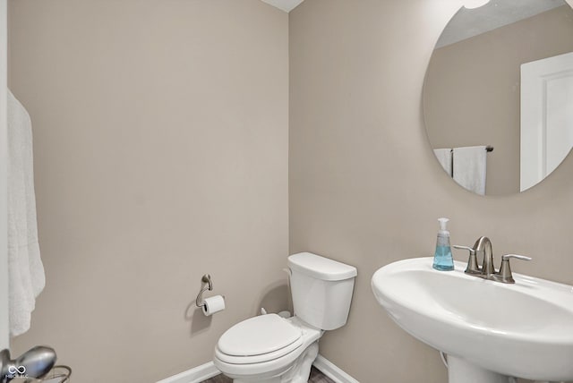 1715 Beyers St, Fortville, IN 46040 - half bathroom featuring baseboards and toilet