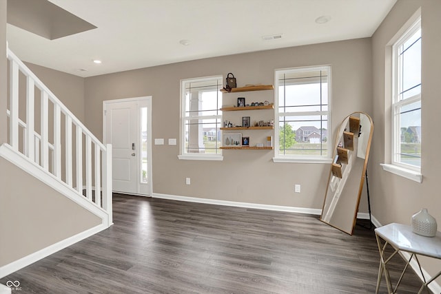 1715 Beyers St, Fortville, IN 46040 - foyer entrance featuring healthy amount of natural light, stairs, dark wood-type flooring, and recessed lighting
