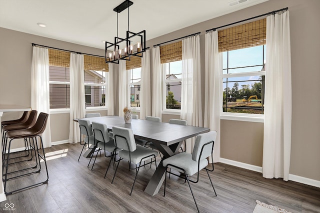 1715 Beyers St, Fortville, IN 46040 - dining area featuring a chandelier and wood finished floors