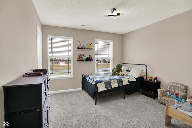 1715 Beyers St, Fortville, IN 46040 - carpeted bedroom with baseboards and a textured ceiling