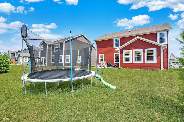 1715 Beyers St, Fortville, IN 46040 - back of property with a trampoline and a yard