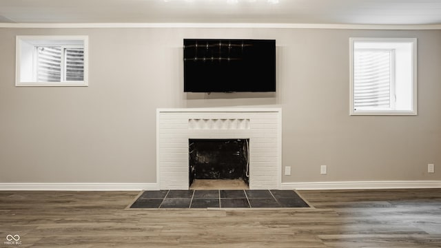 5809 N Washington Blvd, Indianapolis, IN 46220 - detailed view of wood finished floors and a fireplace with flush hearth